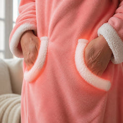 Hands warming in the front pockets of the heated robe