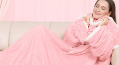 Curled up on the sofa in the Denvale heated robe